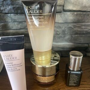 Estee Lauder Skincare Collection with Gold and Cream Accents